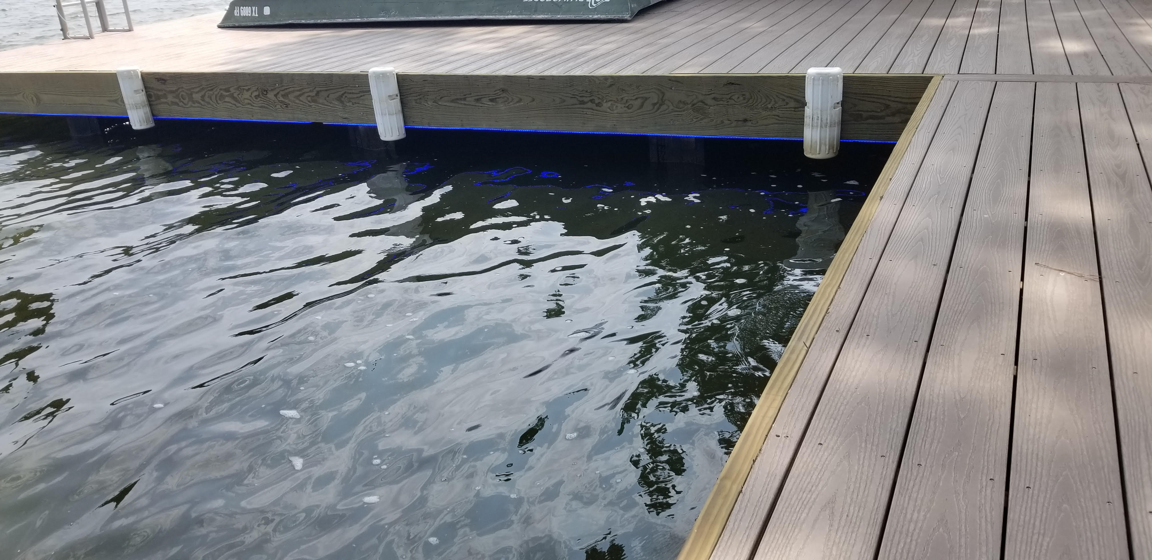 Custom covered boat slip built by Cavalier Custom Decks