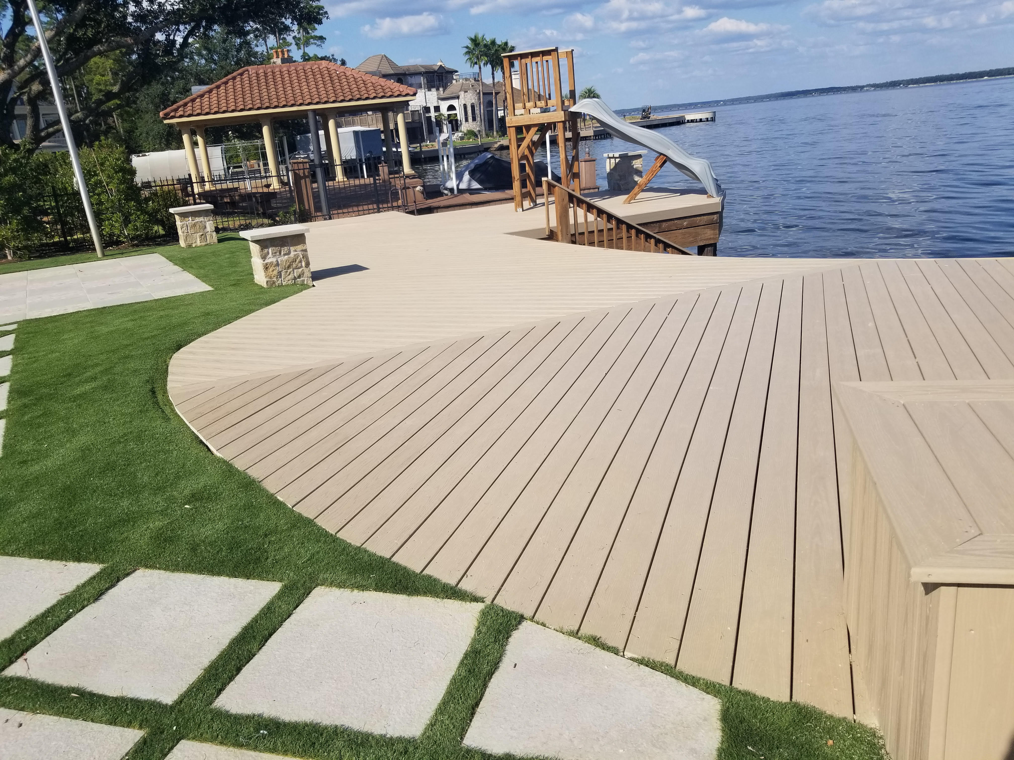 Composite deck built by Cavalier Custom Decks near a Texas lake shoreline