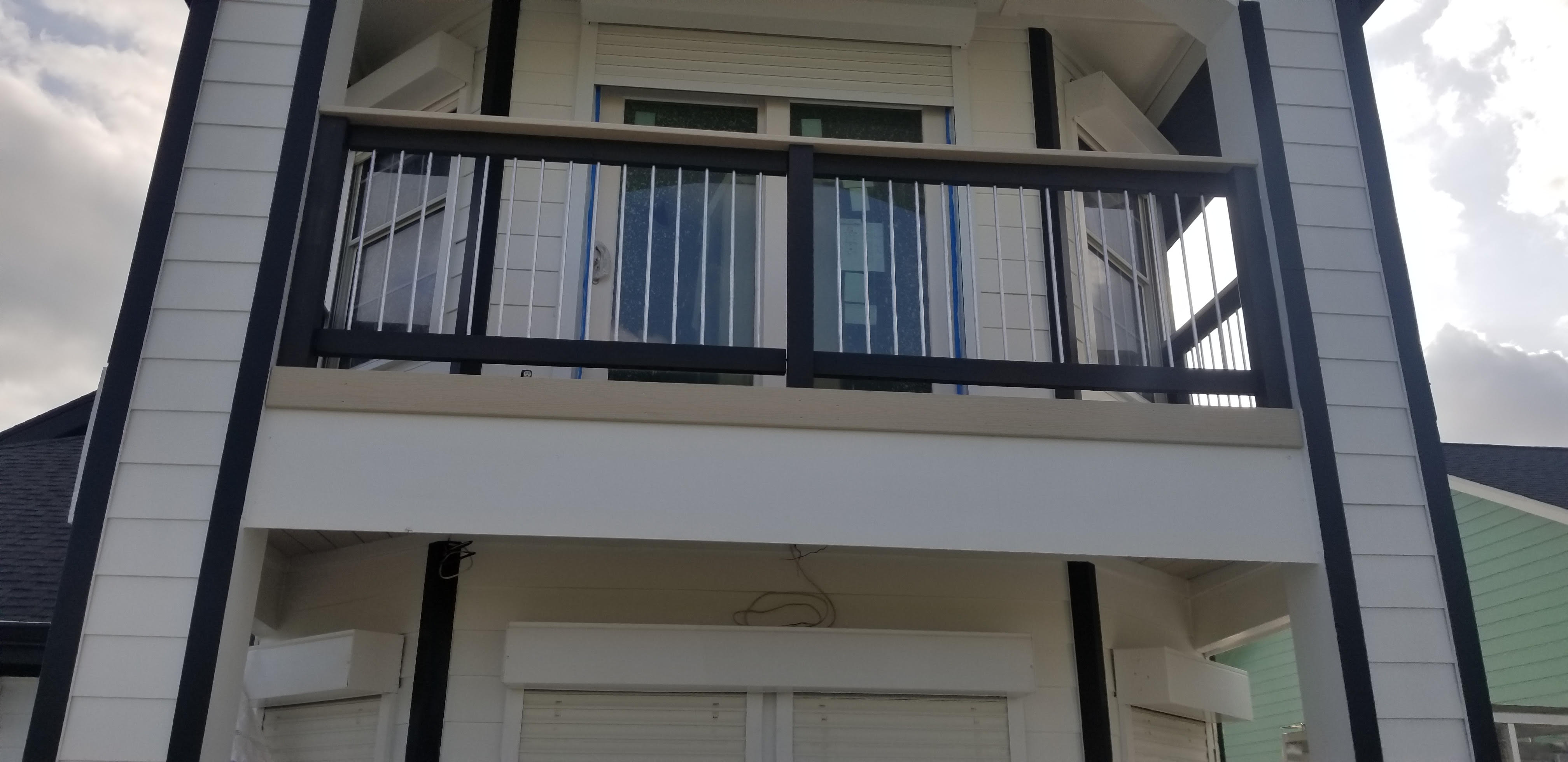 Custom metal deck railing installed by Cavalier Custom Decks